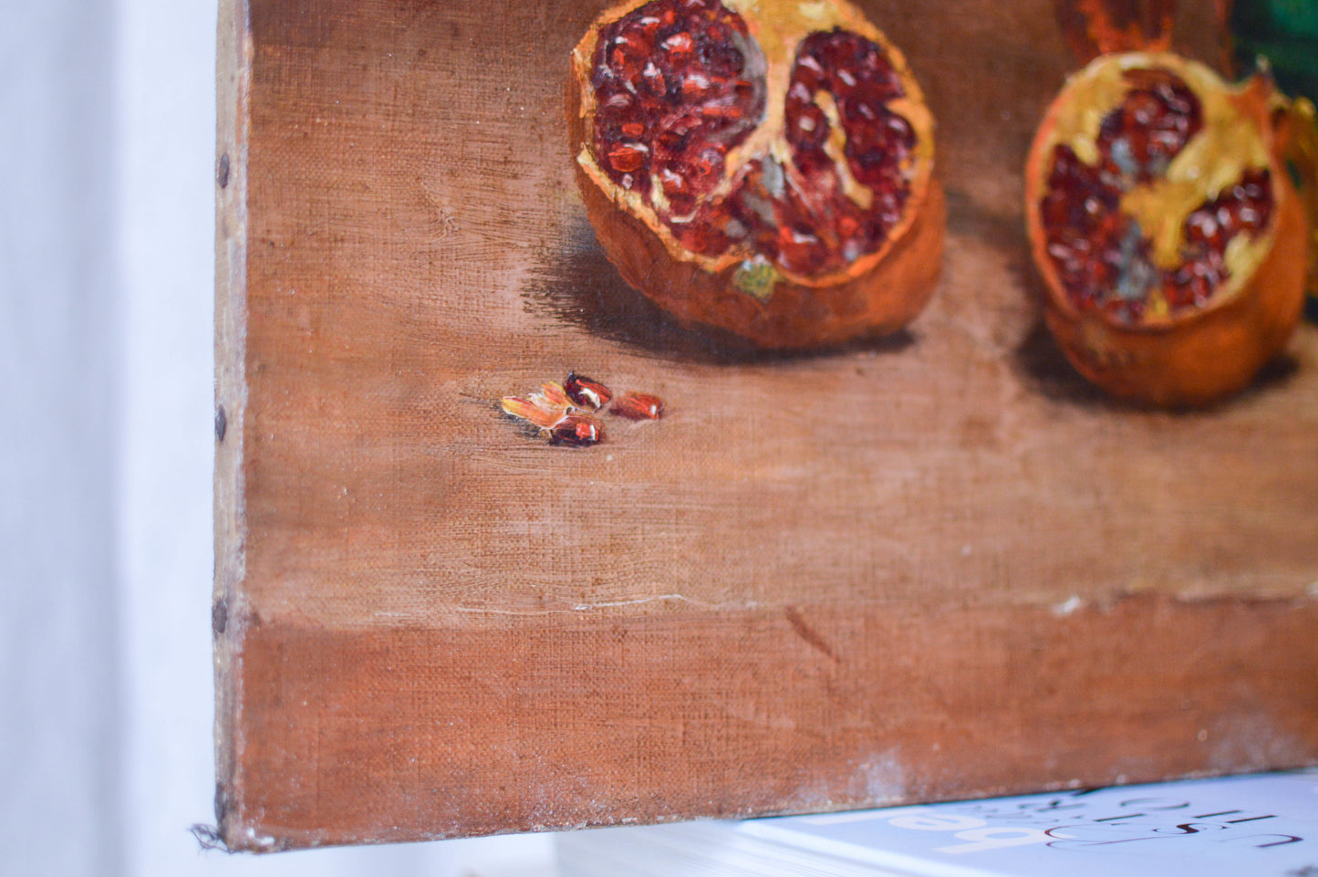 French Still Life of a kitchen scene pomegranates. Signed. Undated.